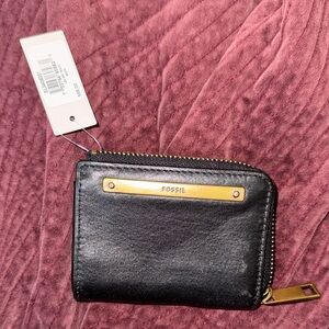 Small, black fossil wallet